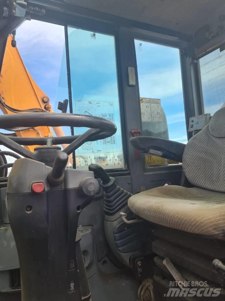 CASE WX 90 Excavatoare cu roti