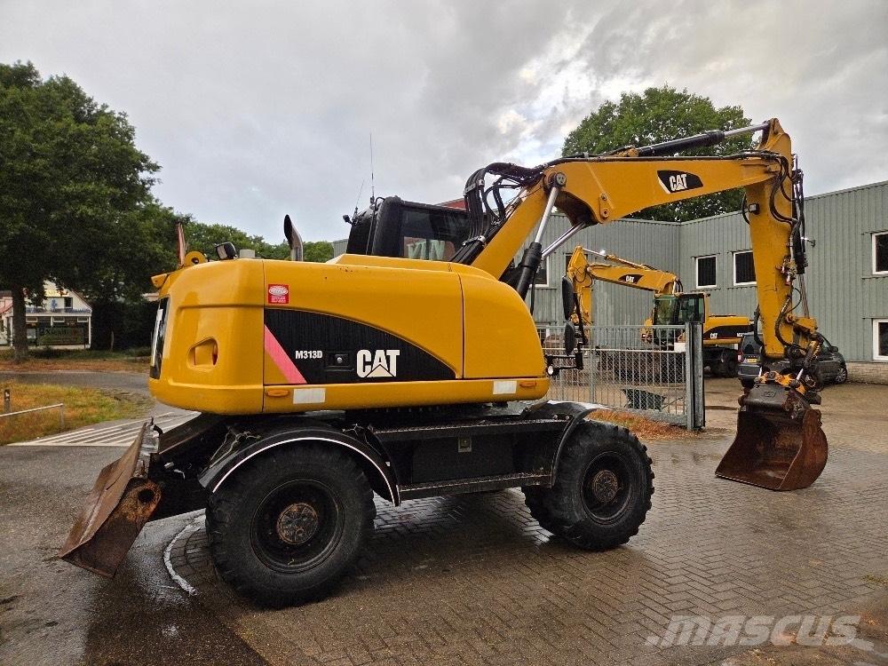 CAT M313D Excavatoare cu roti