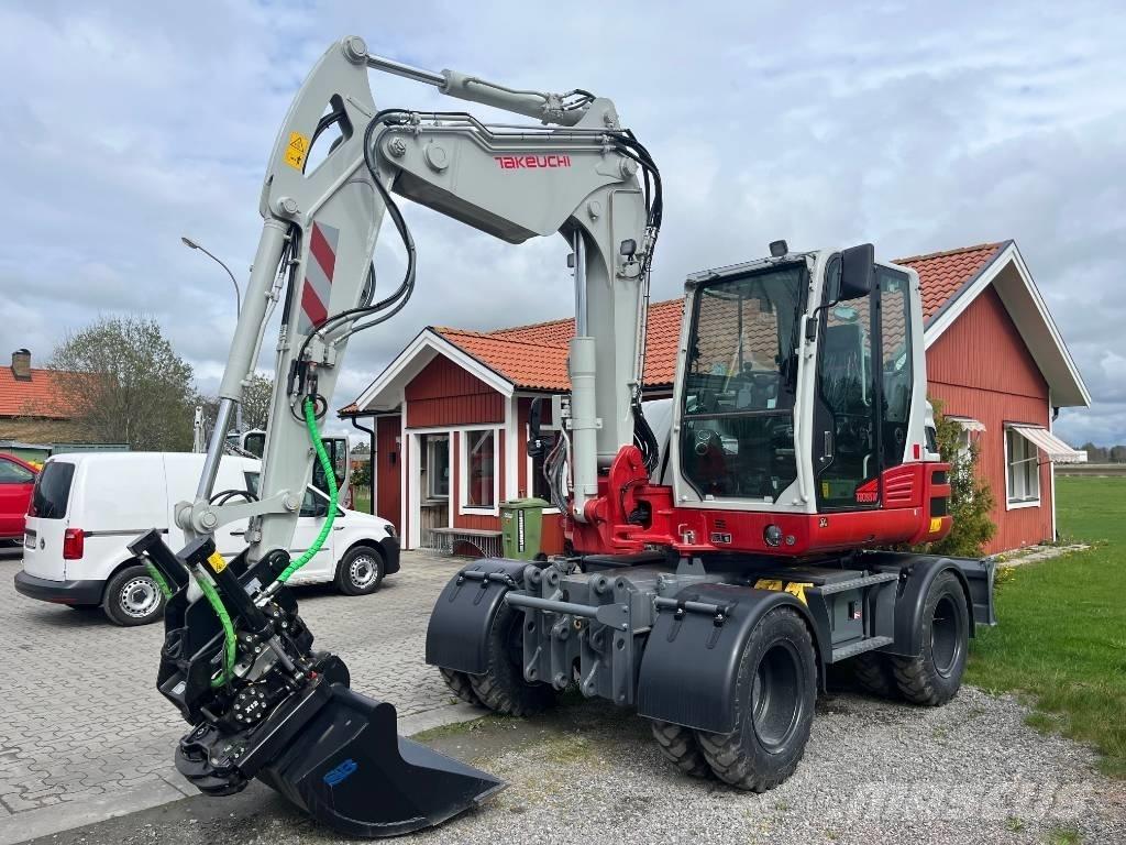 Takeuchi TB 395 W Excavatoare cu roti