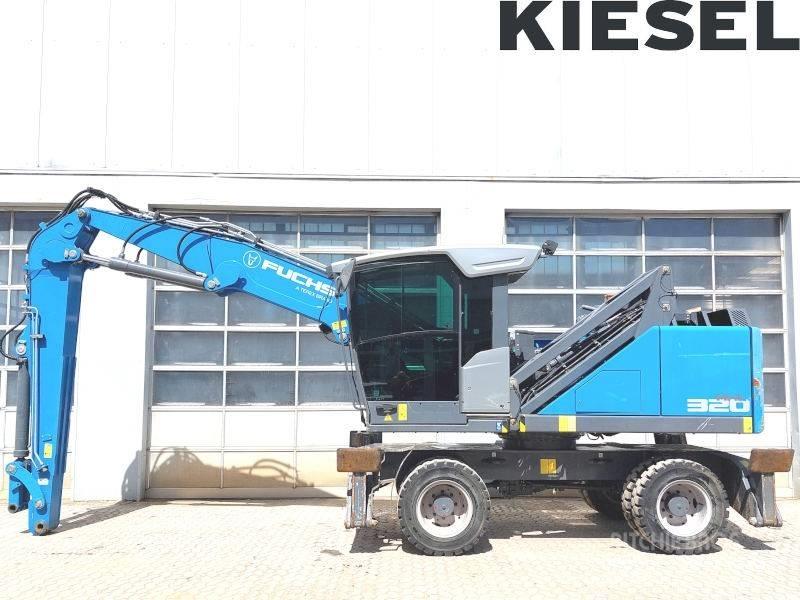 Fuchs MHL 320 F Paleta de manipulare