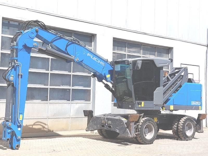Fuchs MHL 320 F Paleta de manipulare