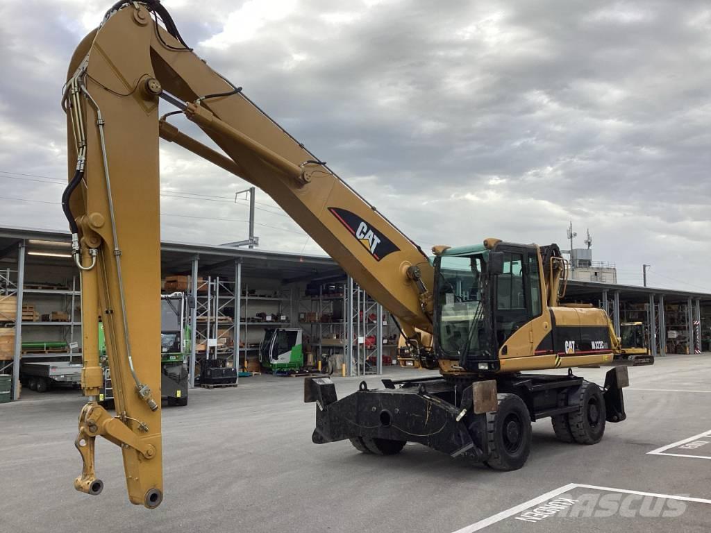 CAT M 322 C MH Paleta de manipulare