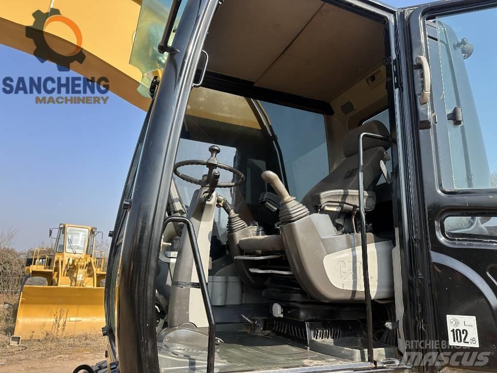 CAT M320D Excavatoare cu roti