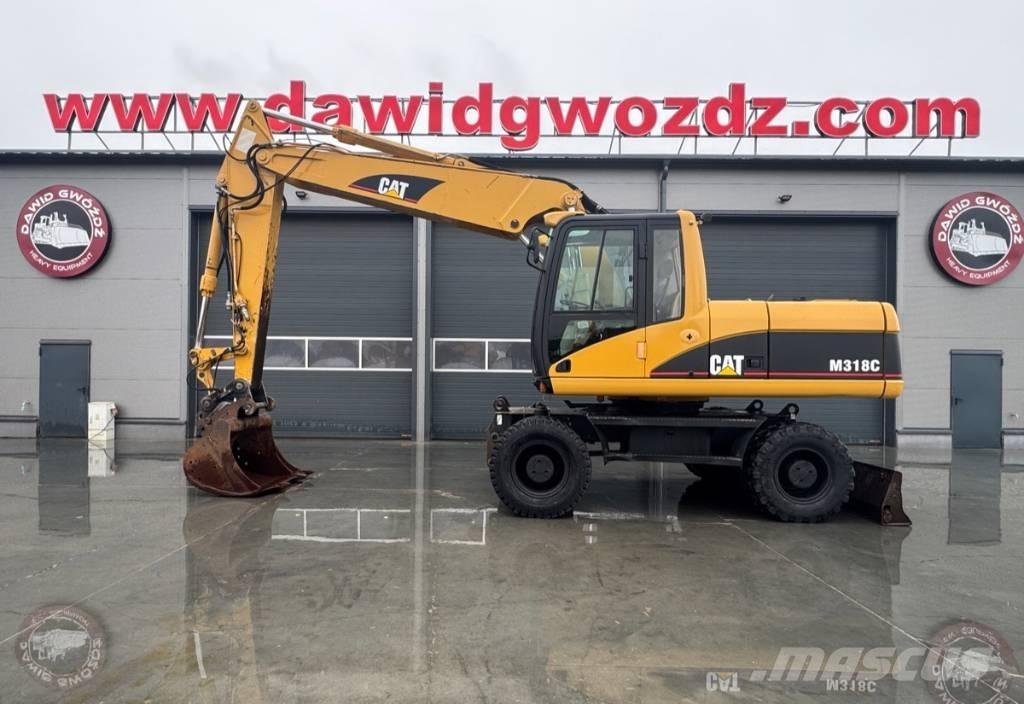 CAT M 318 C Excavatoare cu roti
