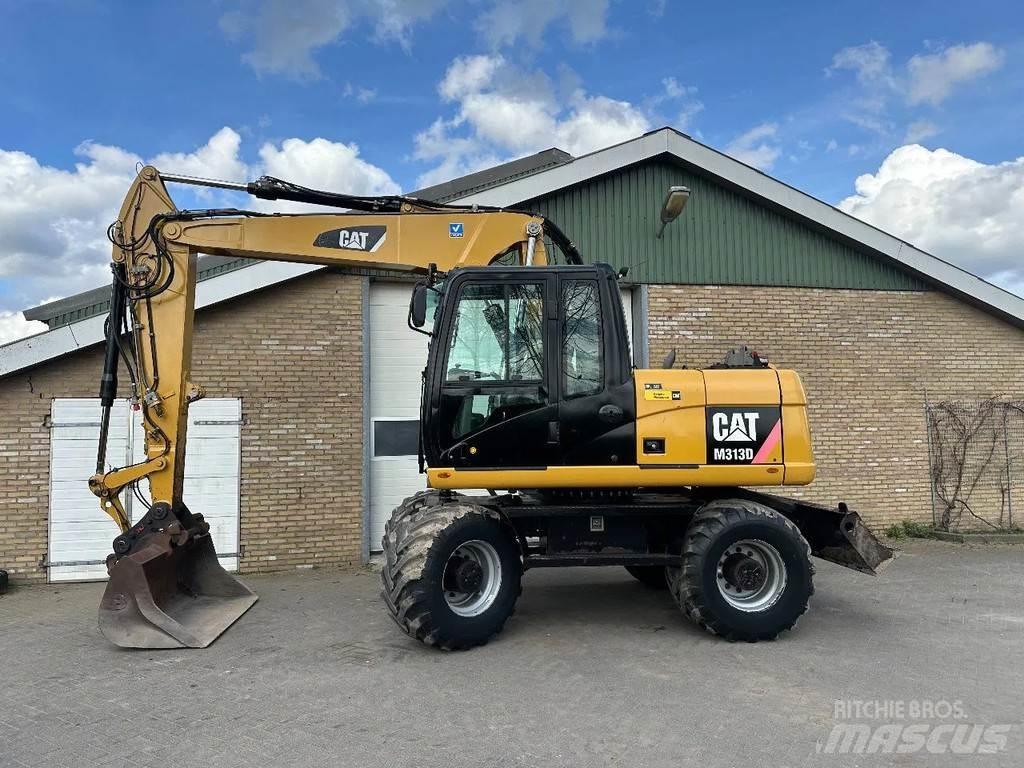 CAT M313D Excavatoare cu roti