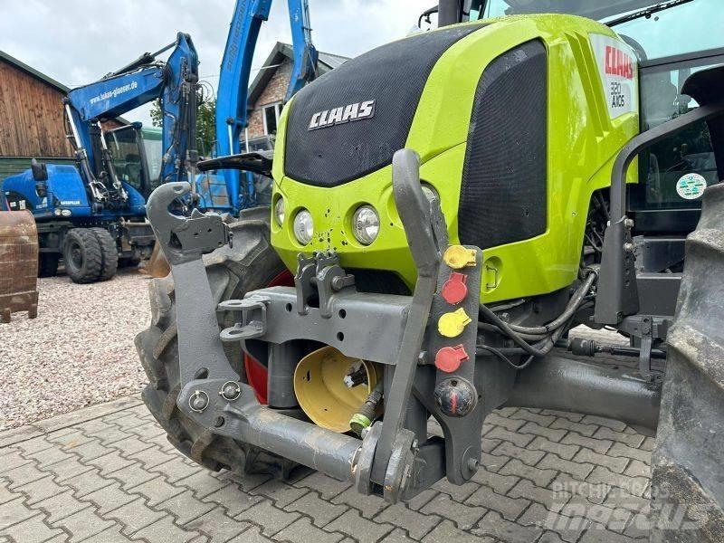 CLAAS Axos 320 Tractoare