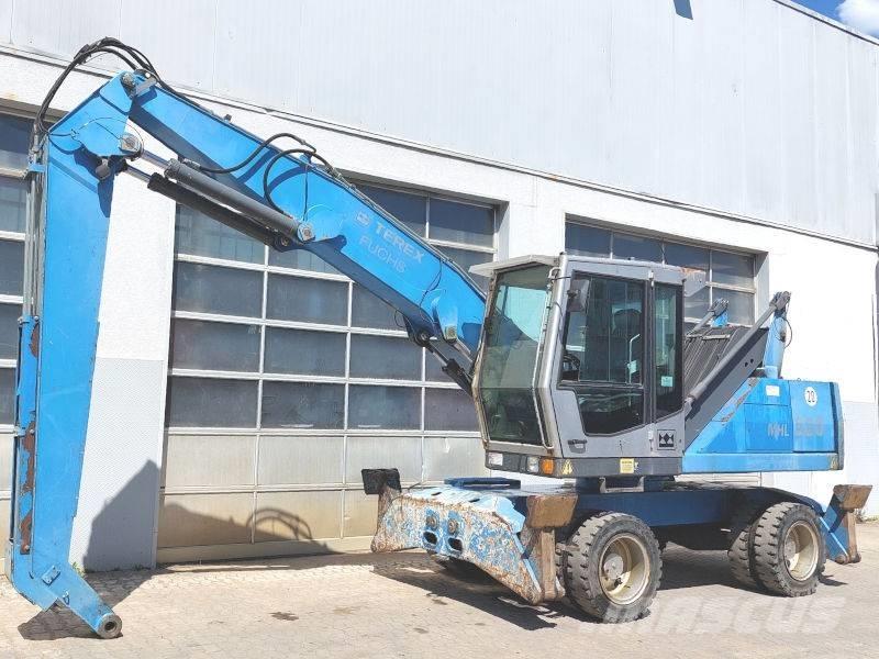 Fuchs MHL 320 Paleta de manipulare