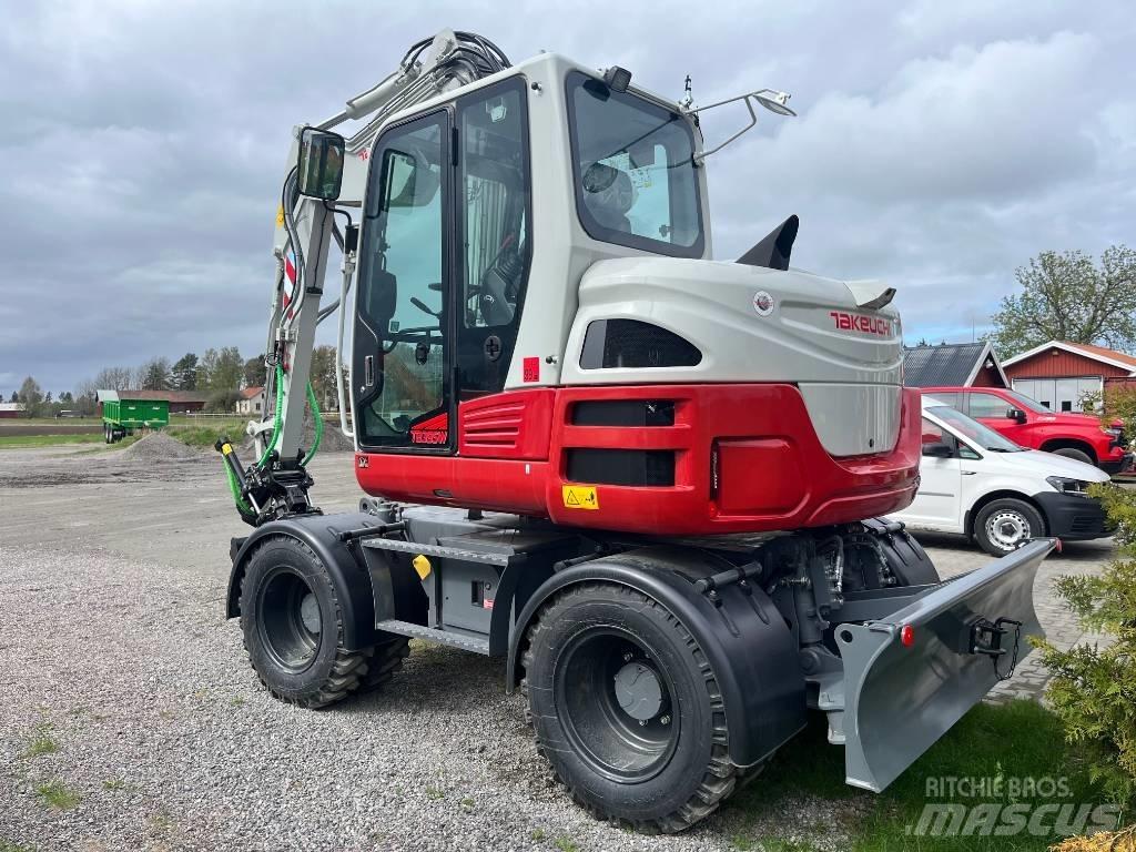 Takeuchi TB 395 W Excavatoare cu roti