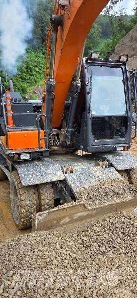 Doosan D 140W-5 Excavatoare cu roti