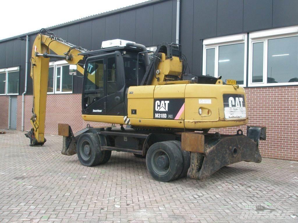 CAT M318D Excavatoare cu roti