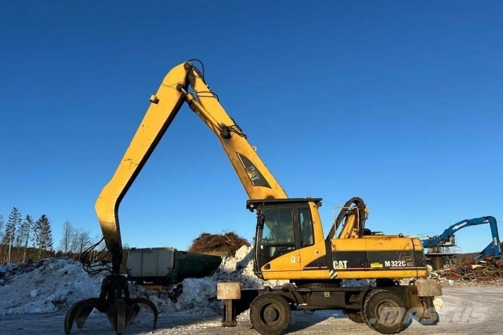 CAT M 322 C MH Paleta de manipulare