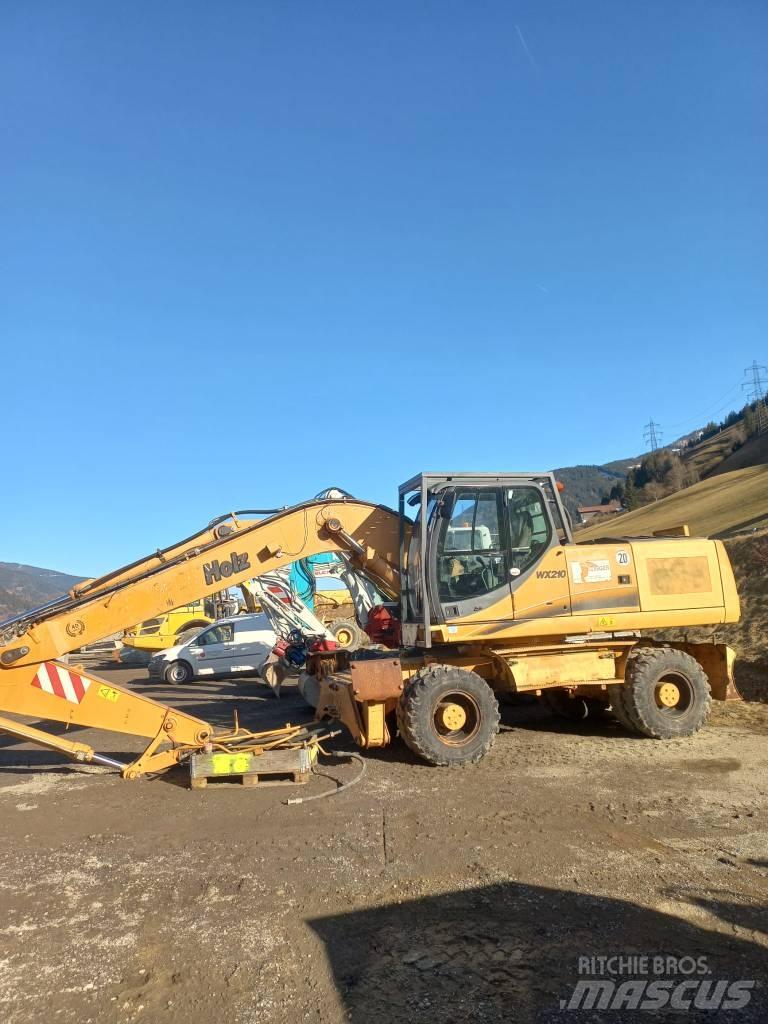 CASE 210WX Excavatoare cu roti