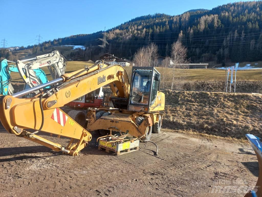CASE 210WX Excavatoare cu roti