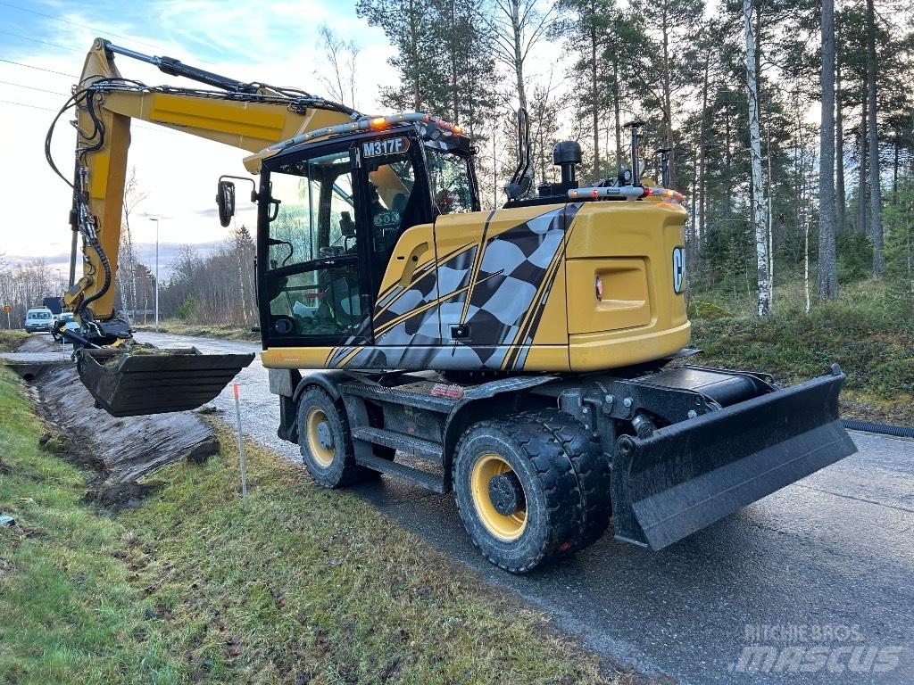 CAT M 317F Excavatoare cu roti