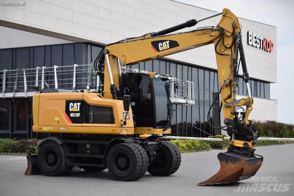 CAT M 318 F Excavatoare cu roti