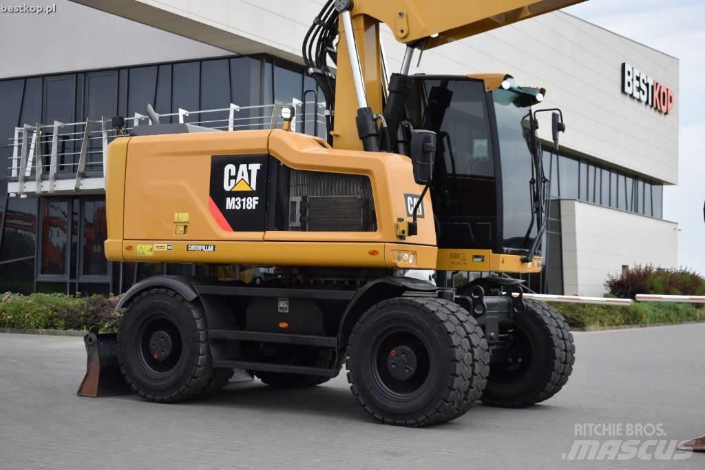 CAT M 318 F Excavatoare cu roti