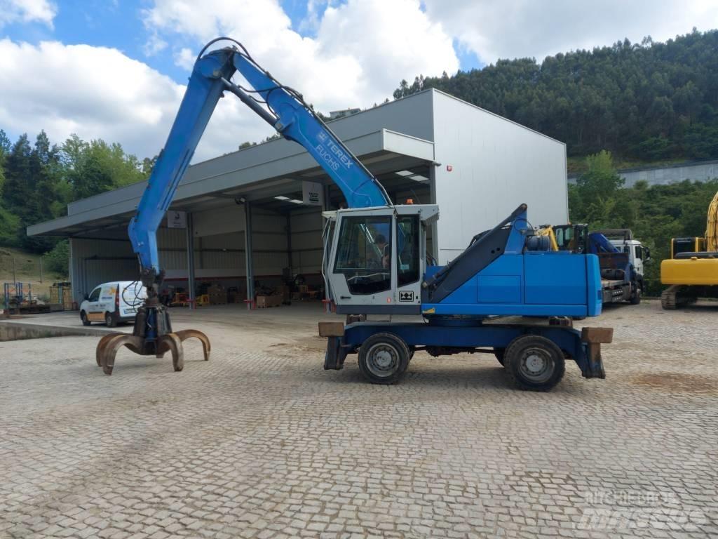 Fuchs MHL 331 Paleta de manipulare