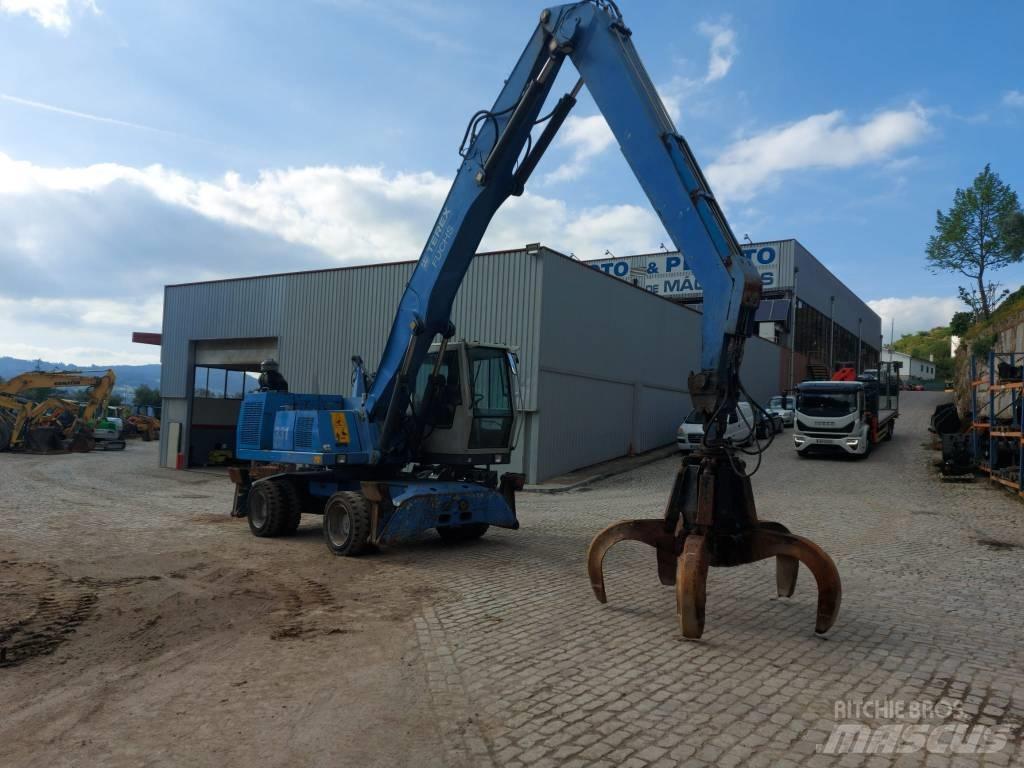 Fuchs MHL 331 Paleta de manipulare