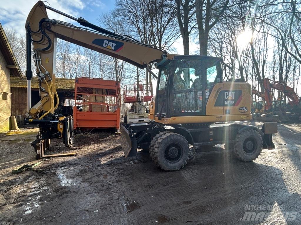 CAT M315 Excavatoare cu roti