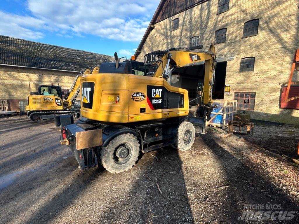 CAT M315 Excavatoare cu roti