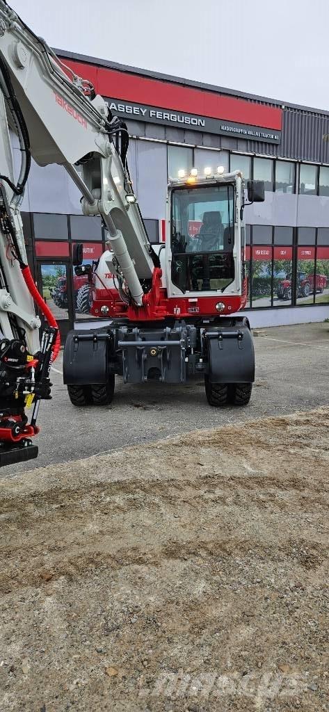 Takeuchi TB 395 W Excavatoare cu roti