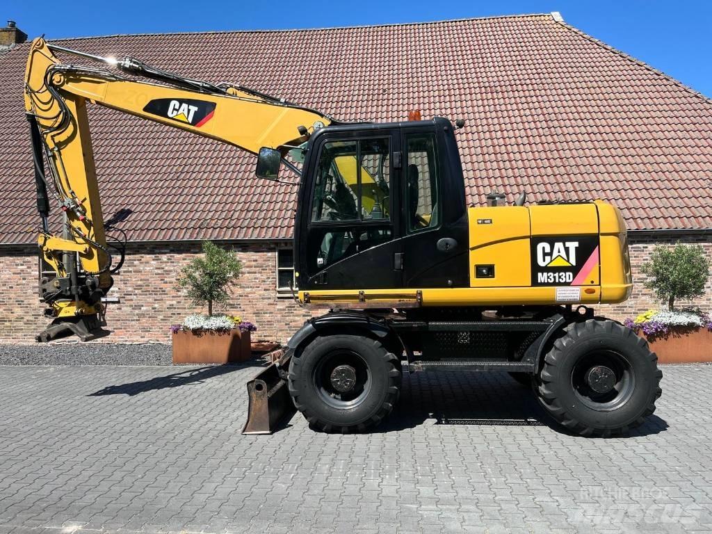 CAT M 313 D Excavatoare cu roti