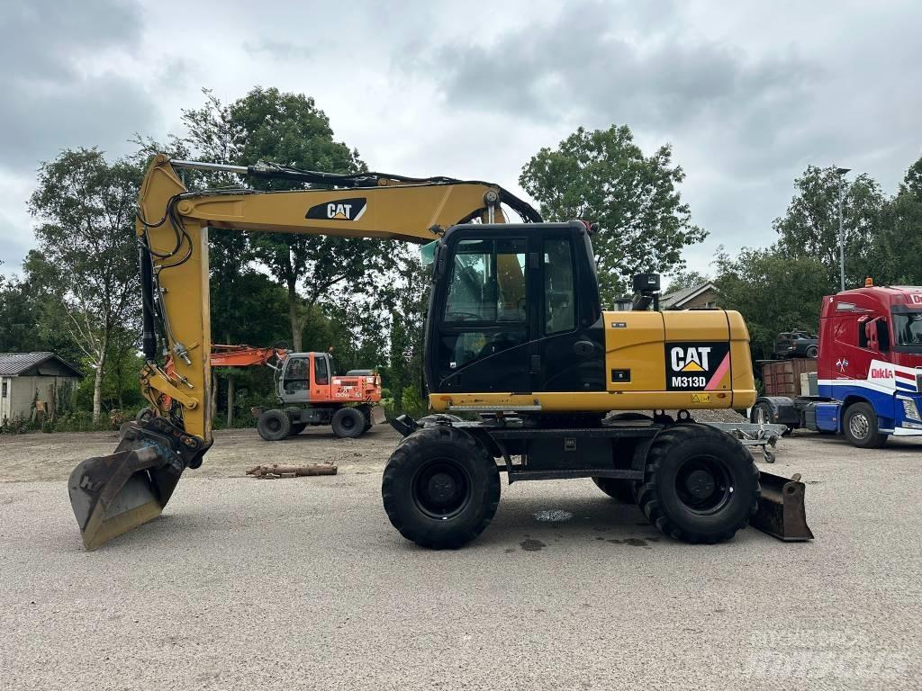 CAT M 313 D Excavatoare cu roti