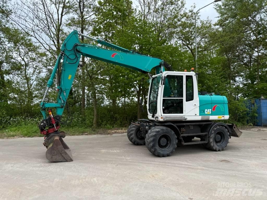 CAT M 313 D Excavatoare cu roti