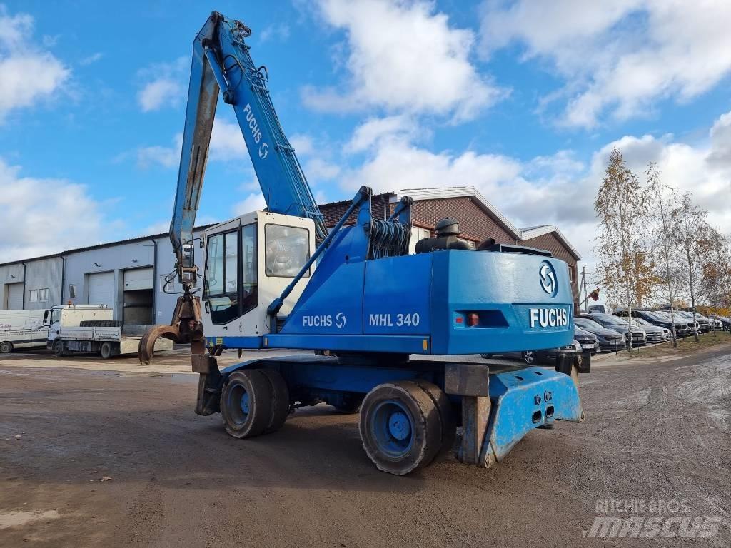 Fuchs MHL 340 Paleta de manipulare