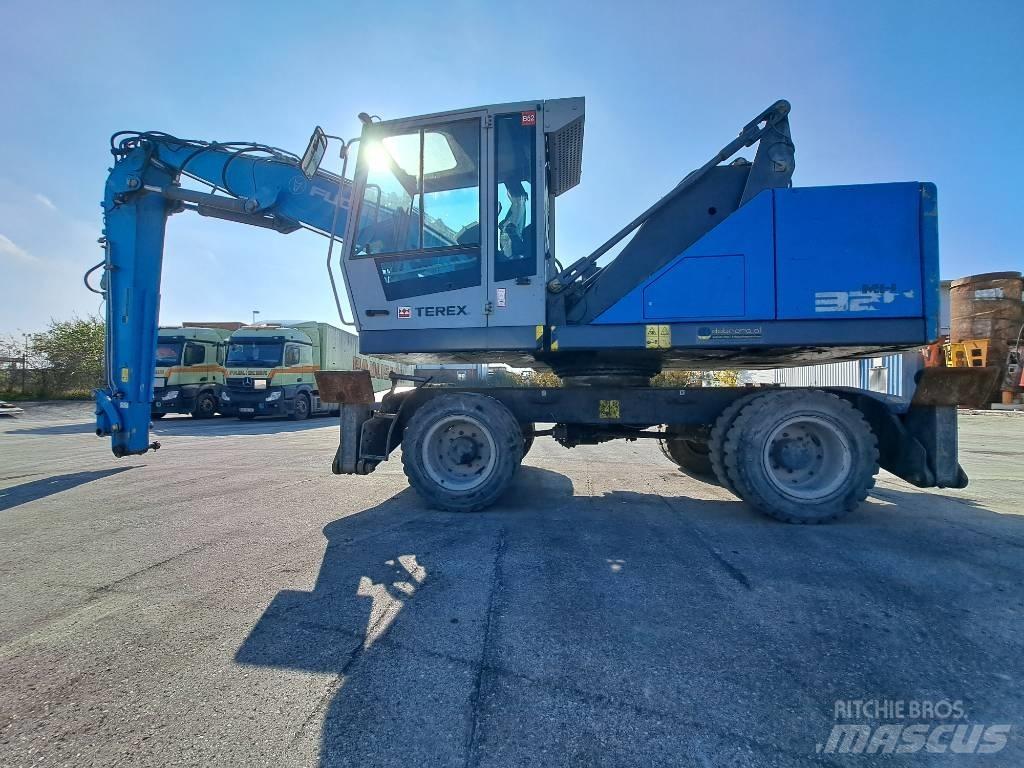 Fuchs MHL 320F Paleta de manipulare