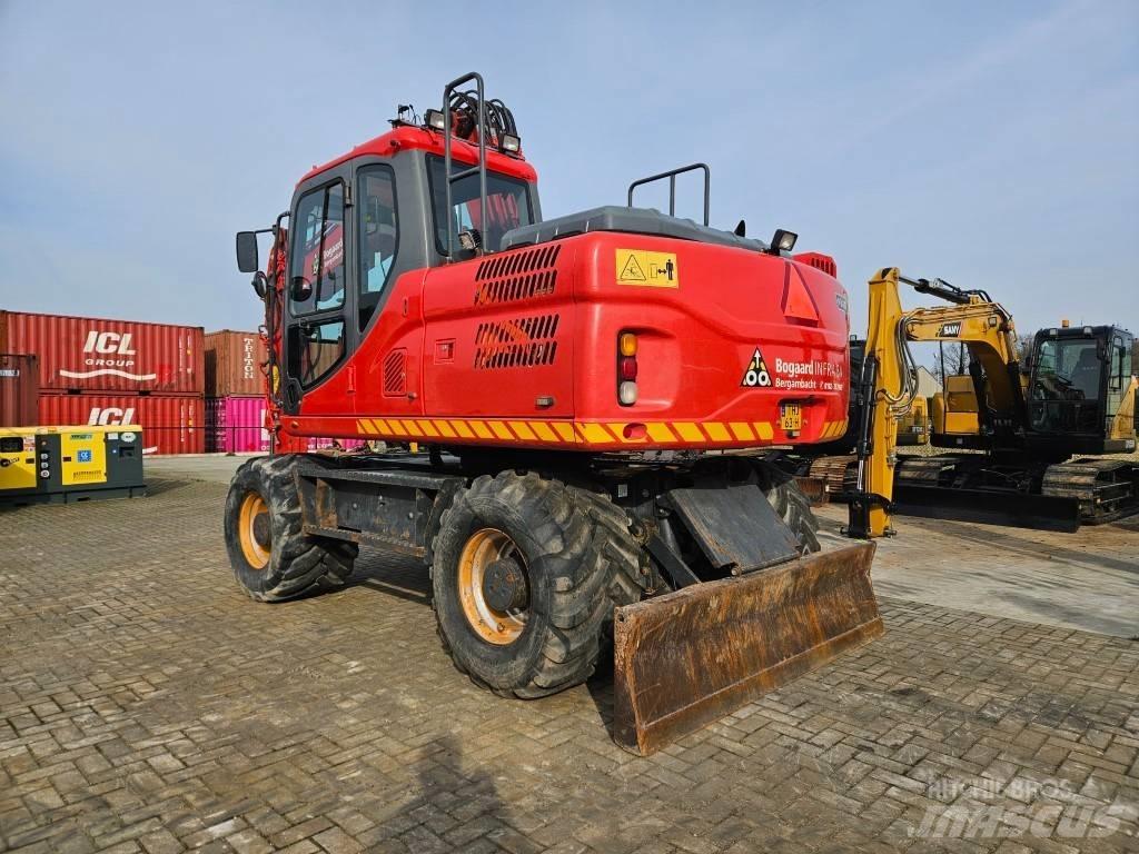 Doosan DX 140 W-3 Excavatoare cu roti