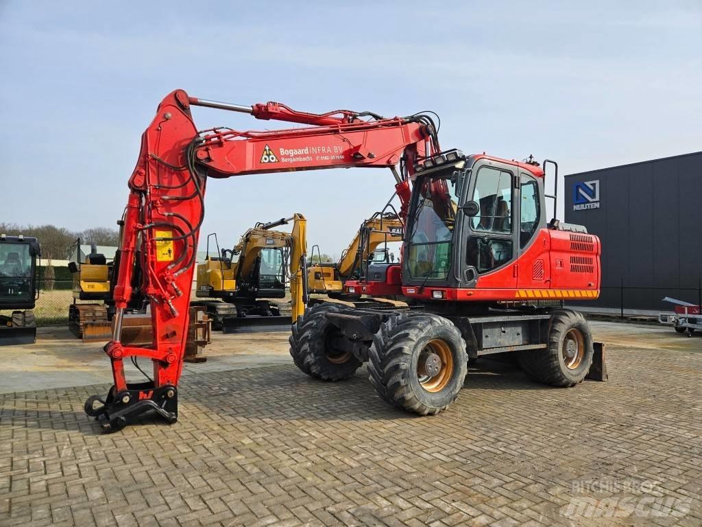 Doosan DX 140 W-3 Excavatoare cu roti
