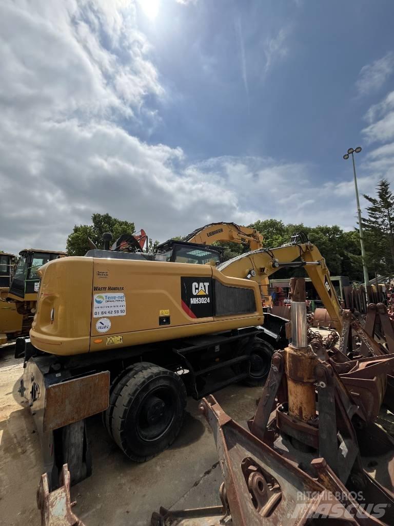 CAT MH 3024 Excavatoare cu roti