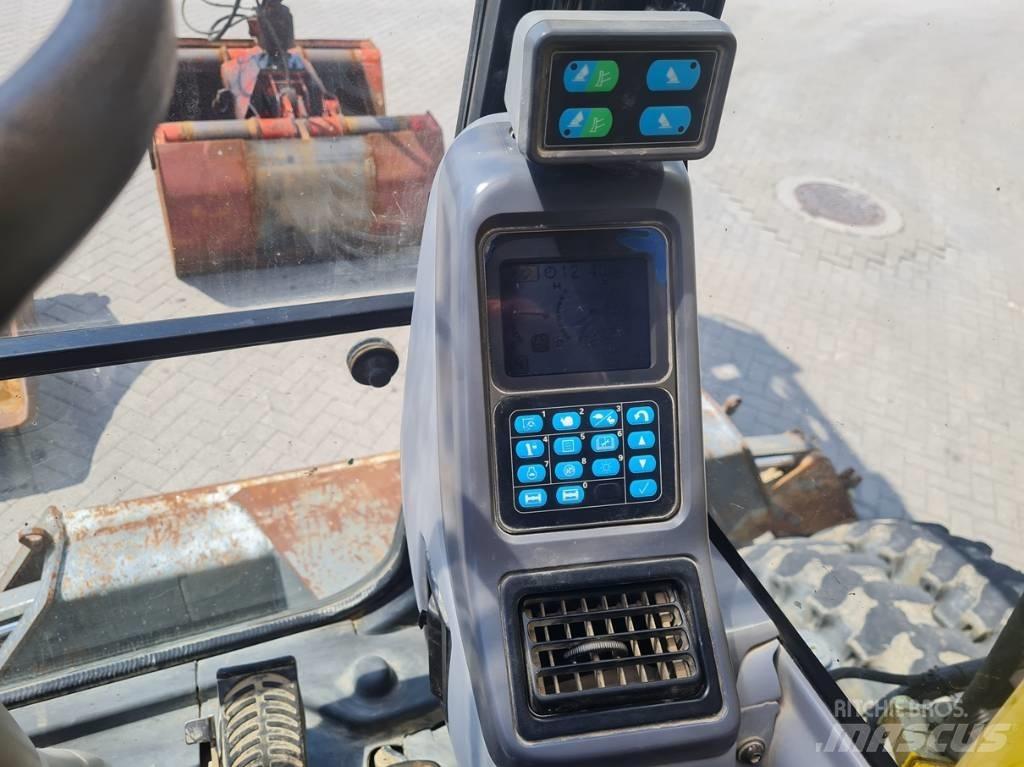 Komatsu PW 140-7 Excavatoare cu roti