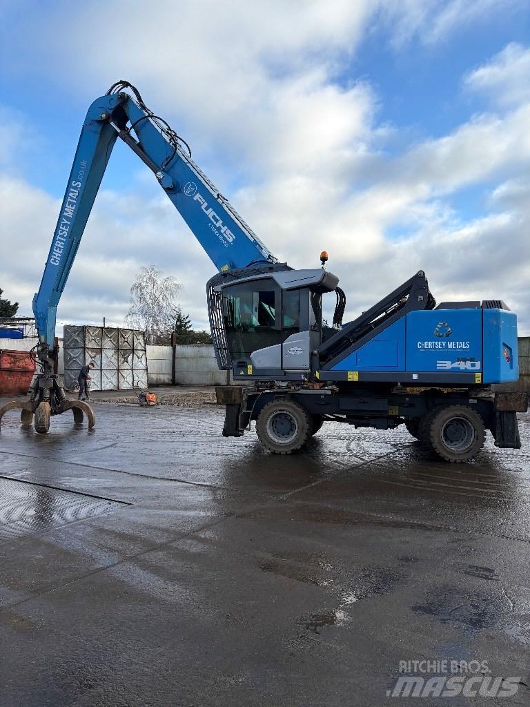 Fuchs MHL 340 Paleta de manipulare