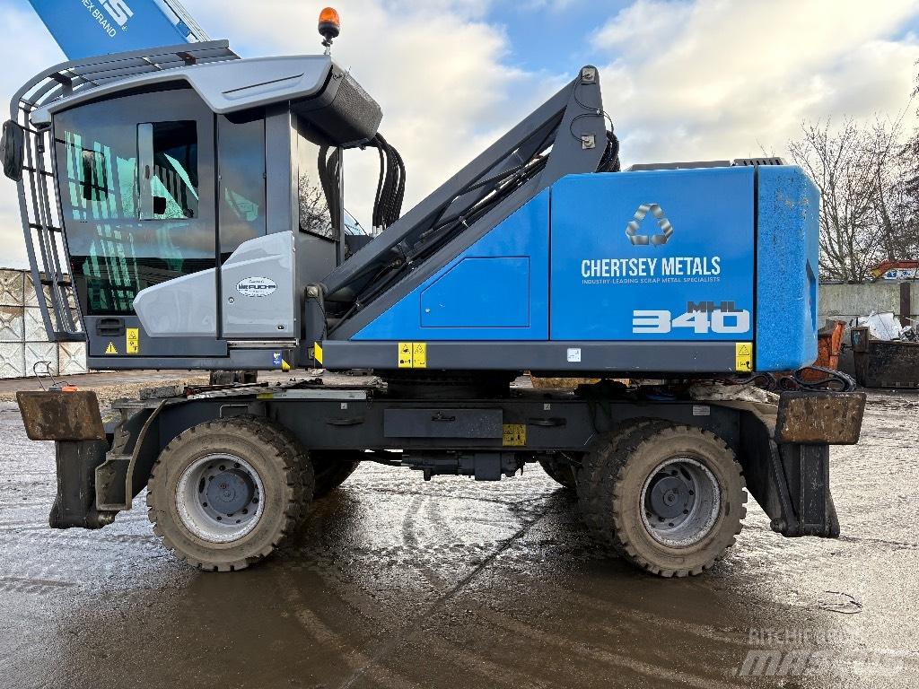 Fuchs MHL 340 Paleta de manipulare
