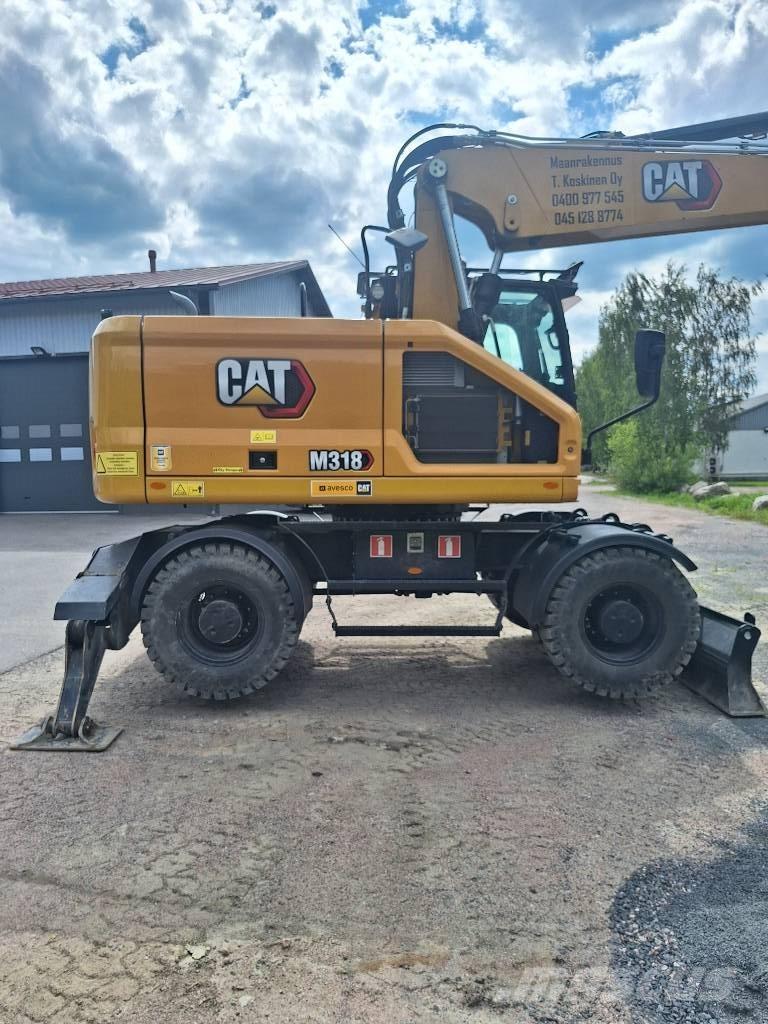 CAT M 318 Excavatoare cu roti