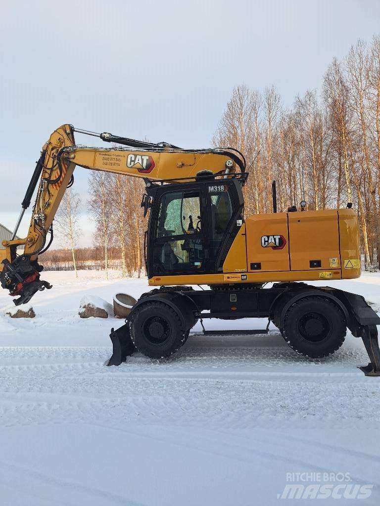 CAT M 318 Excavatoare cu roti