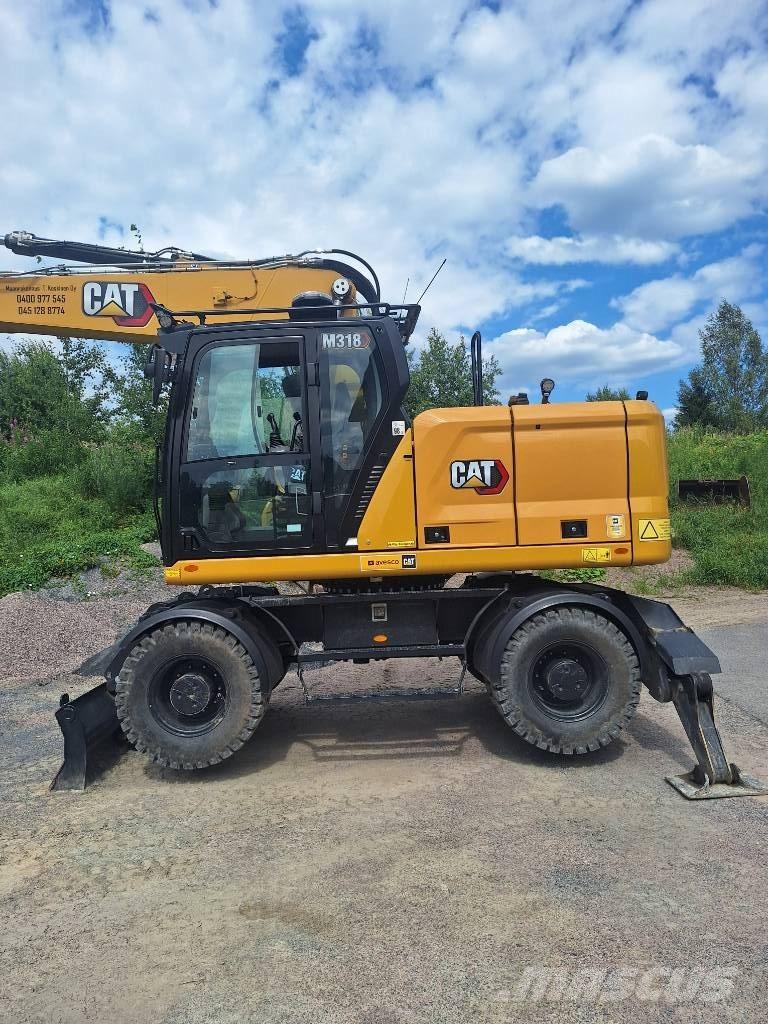 CAT M 318 Excavatoare cu roti