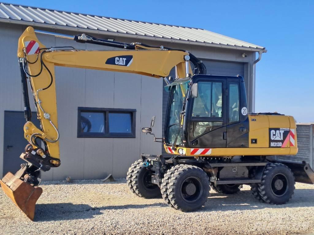 CAT M 313D Excavatoare cu roti