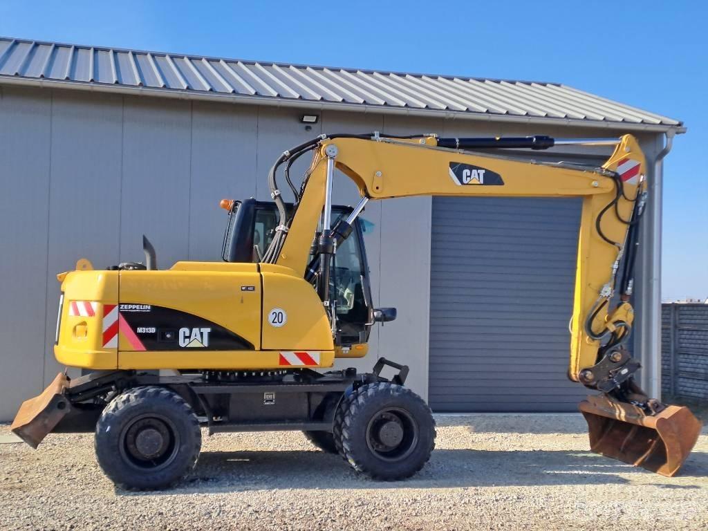 CAT M 313D Excavatoare cu roti