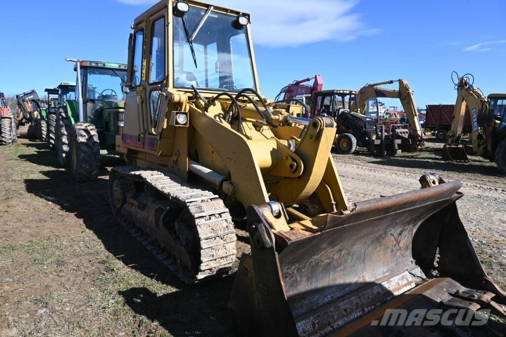 CAT 943 Încarcatoare cu excavator