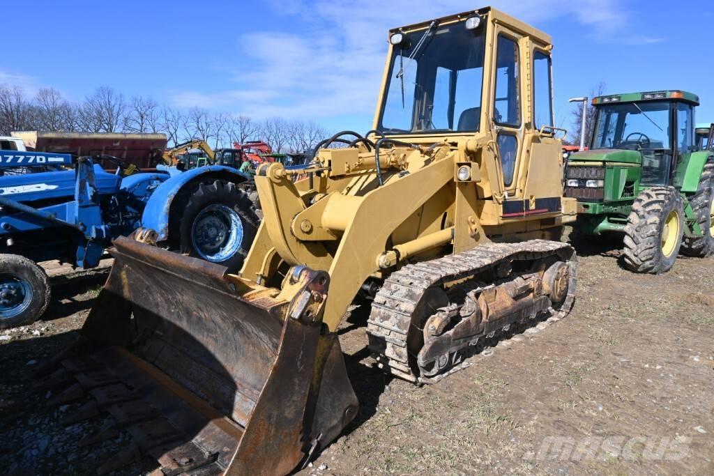 CAT 943 Încarcatoare cu excavator