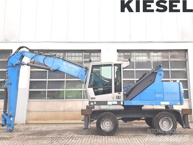 Fuchs MHL 320 D Paleta de manipulare