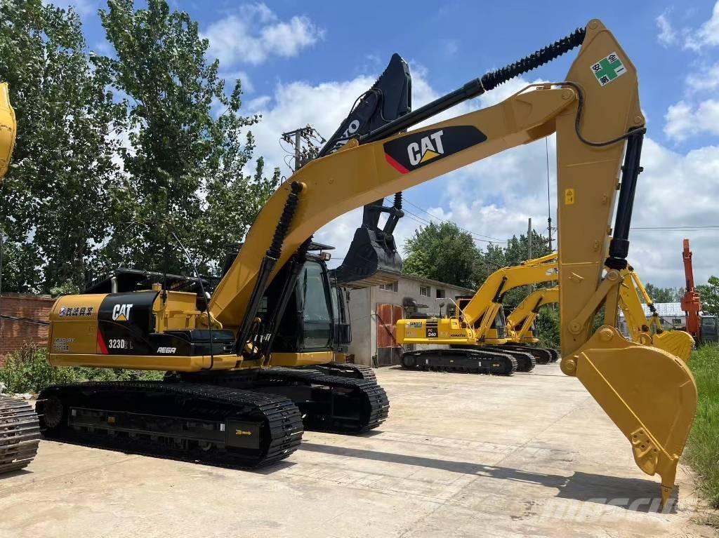 CAT cat323d Excavatoare 7t - 12t