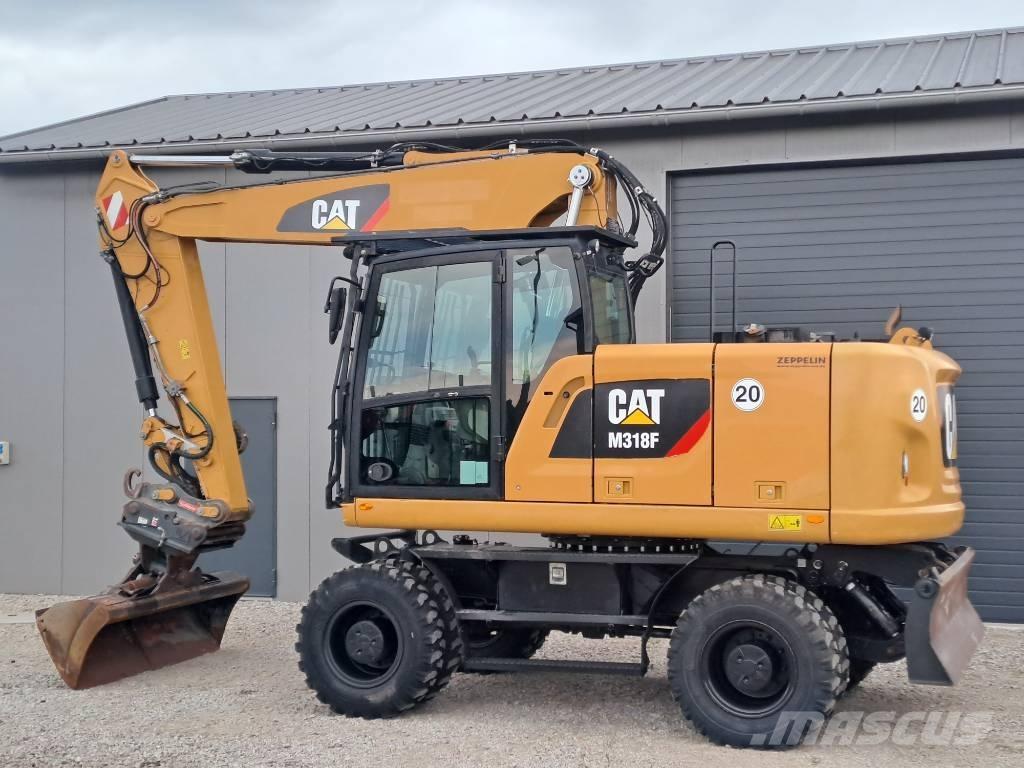 CAT M318F Excavatoare cu roti
