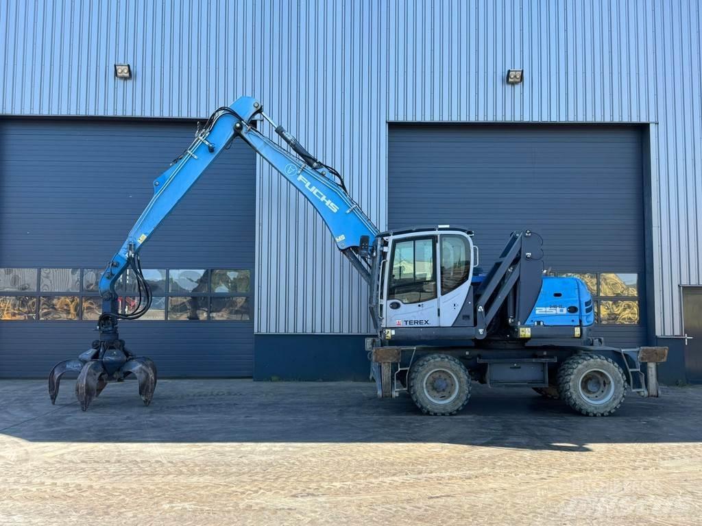 Fuchs MHL 250 E Paleta de manipulare
