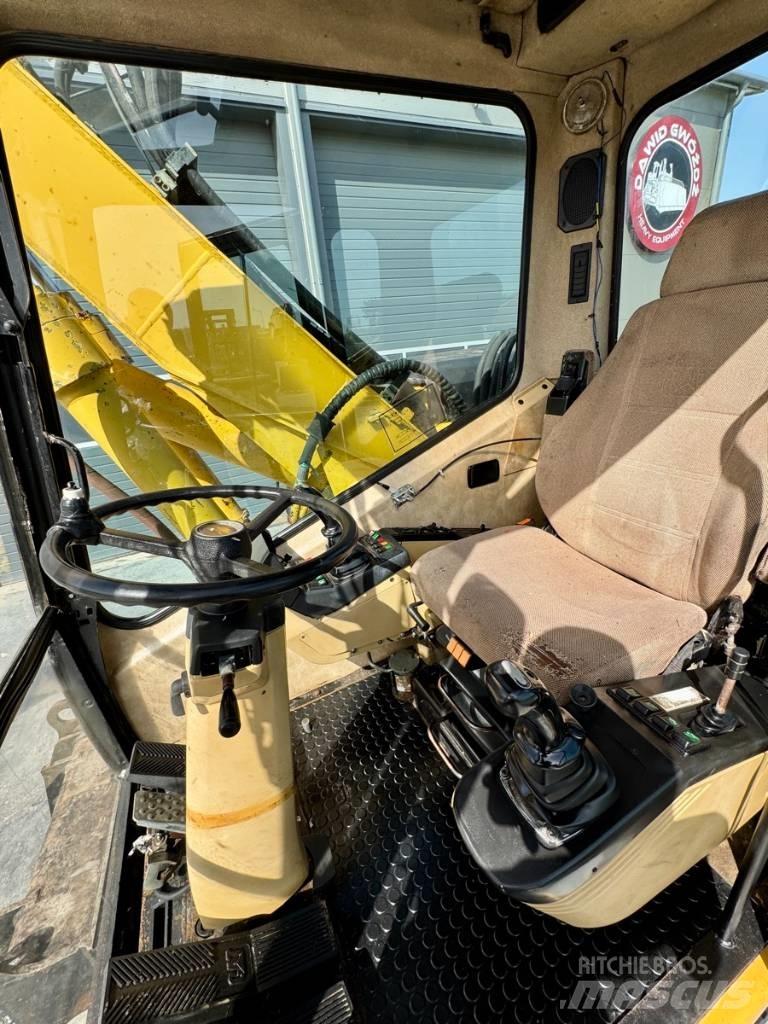 CAT M 312 Excavatoare cu roti