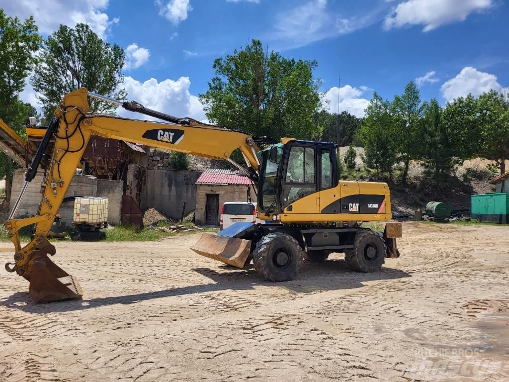 CAT 316d Excavatoare cu roti
