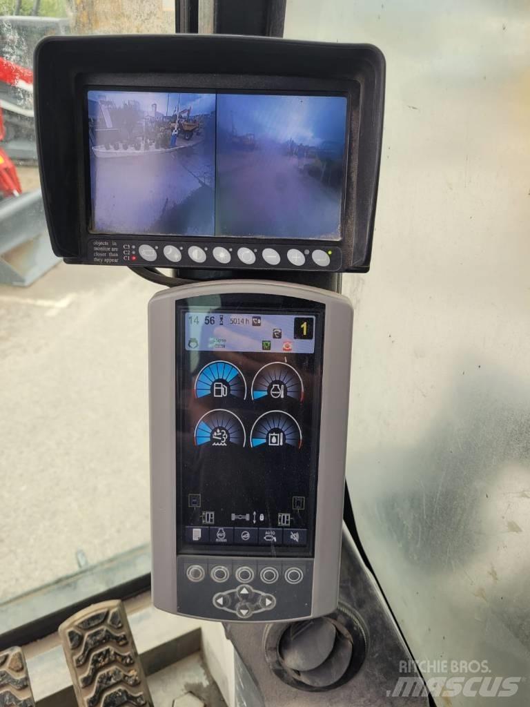 CAT mh3022 Excavatoare cu roti